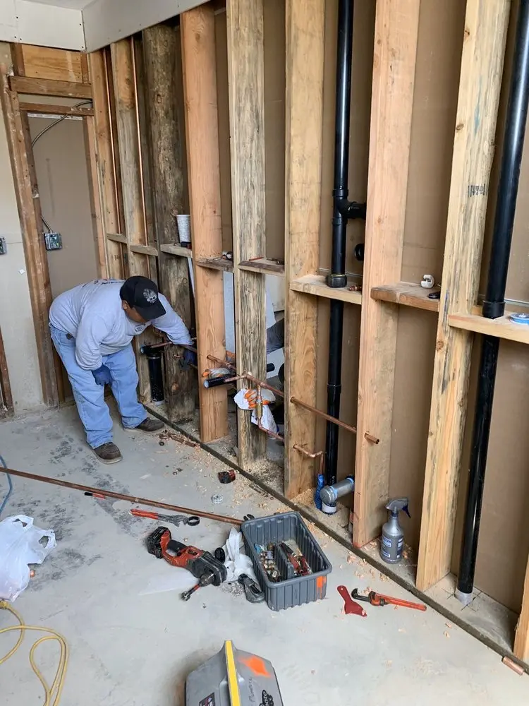 Commercial rough-in plumbing for Water Heater Replacement in Century Gardens Villas
